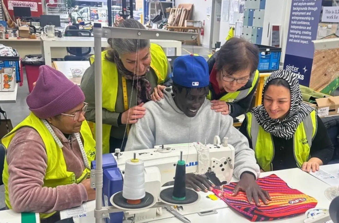 Changkuoth Jiath with the SisterWorks Manufacturing Hub team