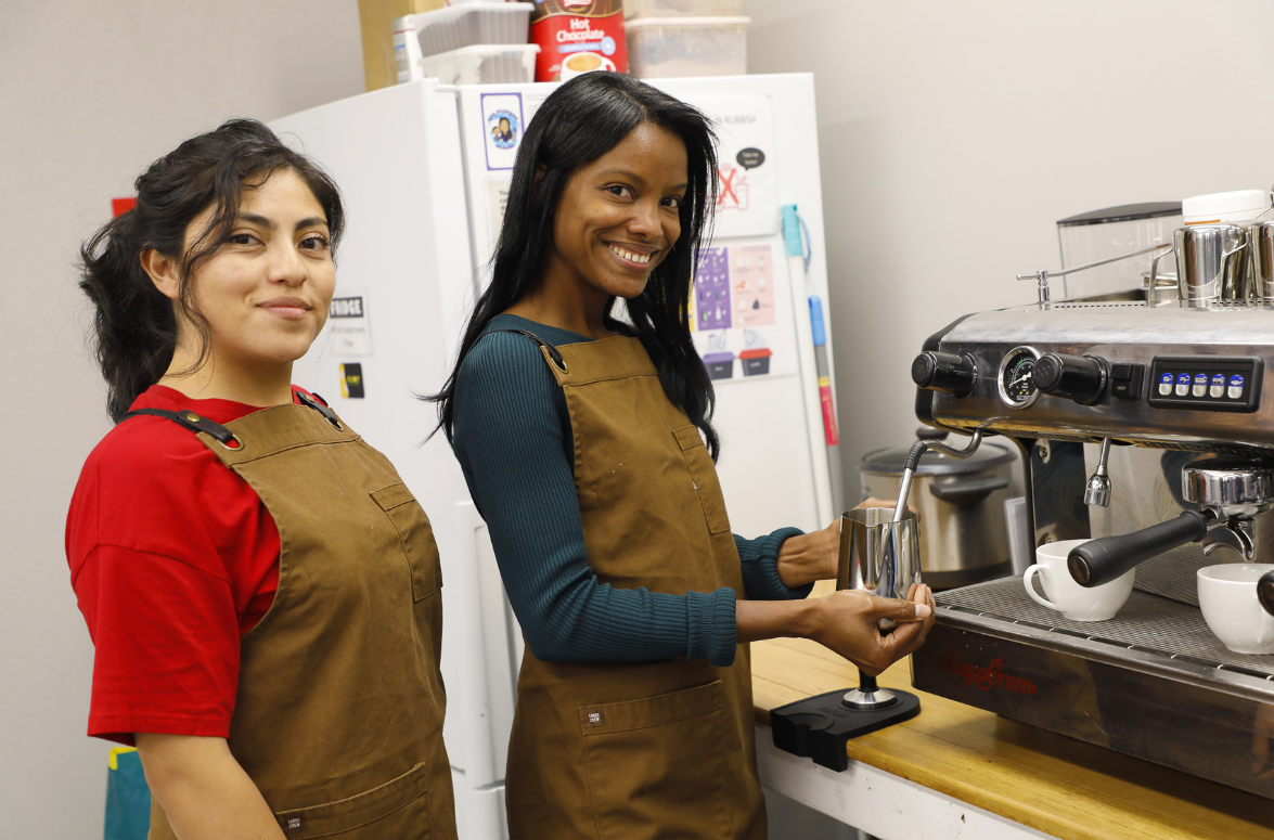 Two Sisters from the Hospitality program making coffee. 